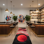 Modern bar interior with colorful artwork, pendant lights, and a patterned rug.