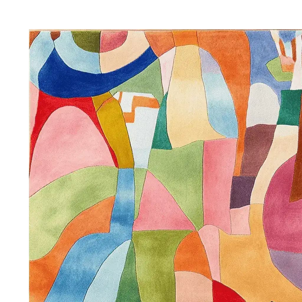 Vibrant modern collage hand tufted area rug featuring an abstract pattern with a variety of colors including blue, green, red, and pink. This contemporary wool rug is perfect for adding a pop of color to your living room decor. Ideal for use as an 8x10 living room rug.