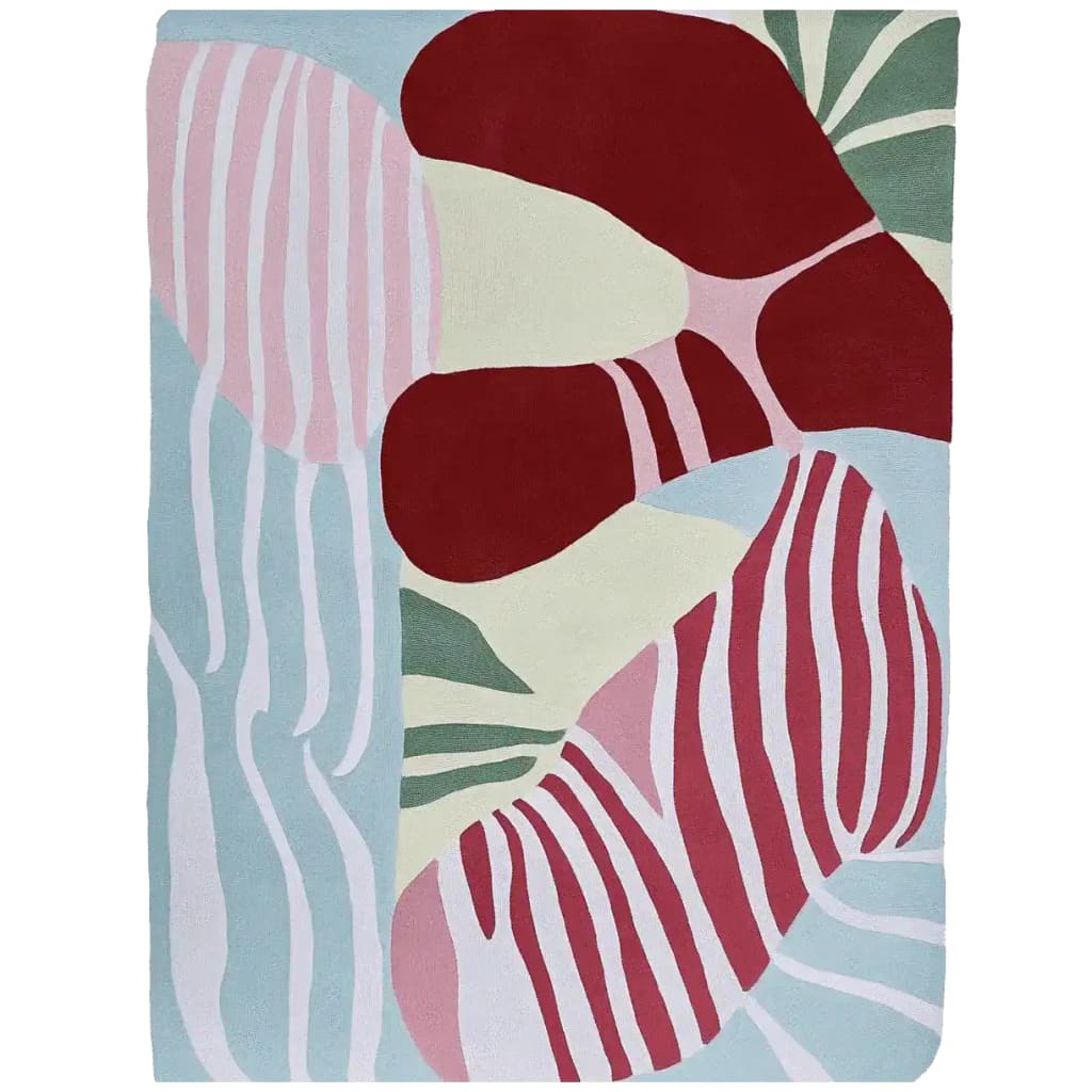 A vibrant area rug featuring a modern abstract design with bold red, pink, and green patterns. This contemporary wool rug adds a stylish touch to any living room.