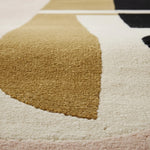 Close-up of a textured rug with geometric pattern