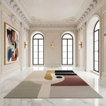 Elegant room with abstract art and a geometric rug on marble flooring.