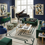 Luxurious living room with a grand piano, green sofas, a contemporary wool rug, and decorative elements.