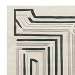 Close-up view of a Modern Motion Maze hand-tufted area rug, showcasing a contemporary design with bold, abstract lines in contrasting colors. Perfect for adding a stylish touch to large living rooms, this wool rug combines elegance with modern aesthetics.