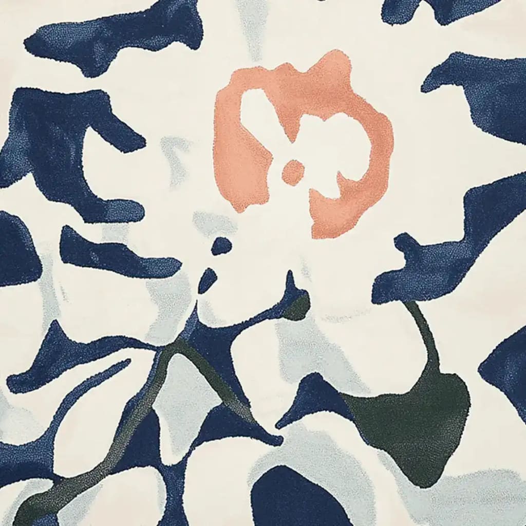 Close-up view of the Modern Pattern Pulse Hand Tufted Rug, showcasing its contemporary abstract design. This wool area rug features bold navy and coral patterns, perfect for adding a stylish touch to large living room spaces. Ideal as an area rug for living room settings.