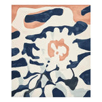 boho bedroom with a cityscape view, colorful rug, and wooden furniture.
