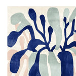 A modern plant bloom hand tufted area rug featuring an abstract design with bold blue and soft pastel colors, ideal for adding a contemporary touch to living rooms. This wool rug showcases a unique pattern perfect for those seeking stylish area rugs for living rooms.