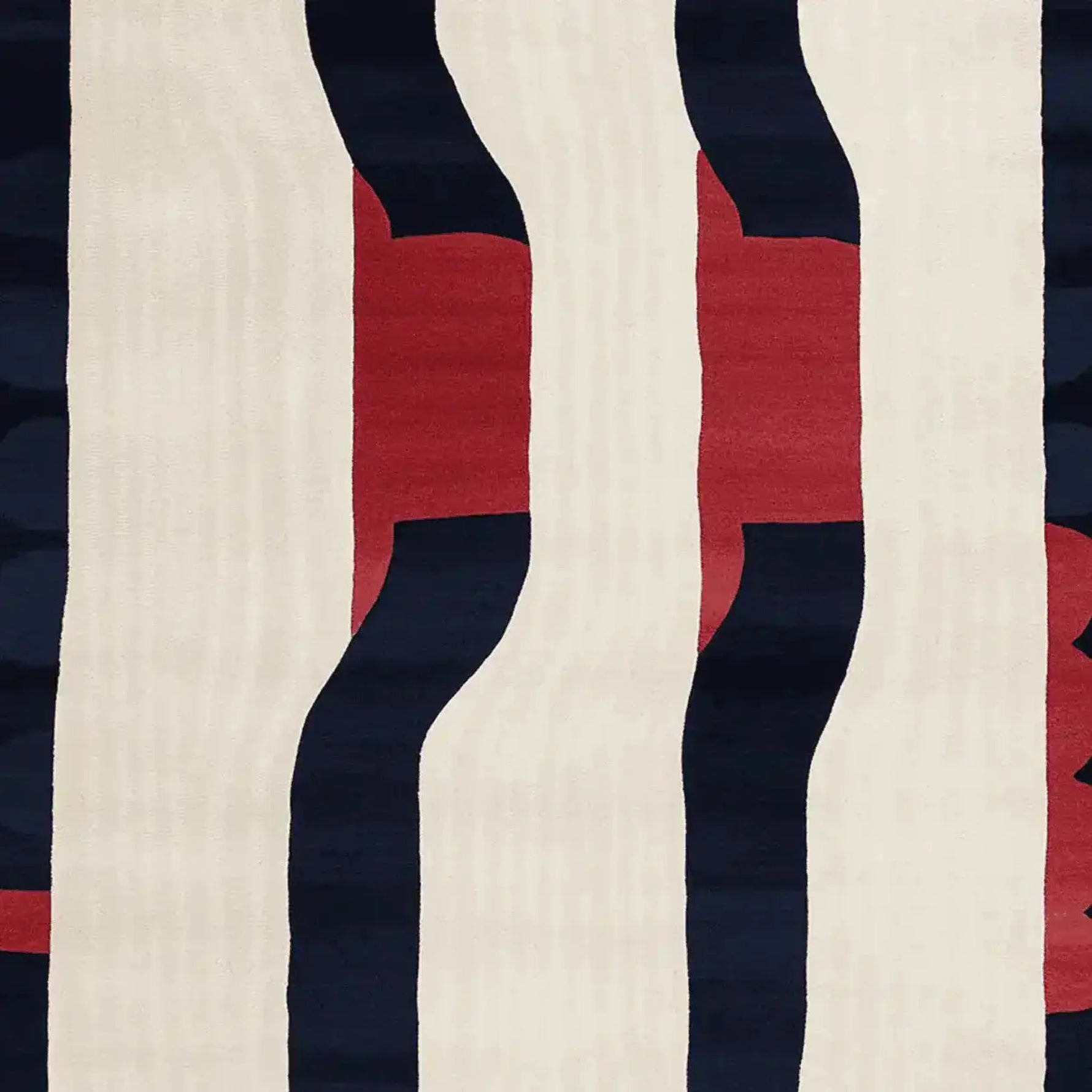 Modern hand tufted area rug with an abstract design featuring bold navy and red stripes on a cream background, perfect for contemporary living rooms. This wool rug is ideal for large living room spaces, measuring 8x10.