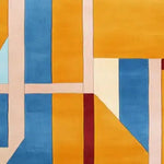 A vibrant area rug showcasing a modern sunset grid design, featuring bold geometric patterns in rich blue, mustard yellow, and soft pink hues. This contemporary wool rug is perfect for adding a touch of elegance to your living room. Ideal for spaces needing an 8x10 rug, it combines style and comfort effortlessly.