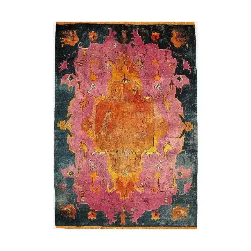 Vibrant Modern Tribal Hard Viscose Hand Knotted Wool Area Rug featuring a rich tapestry of colors including pink, orange, and dark tones, perfect for a dining room setting. This contemporary rug adds a bold statement to any dining table area, reminiscent of Persian rug designs.