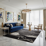 Modern living room with a blue sofa, a contemporary wool rug, abstract art, and a chandelier.