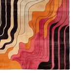 A vibrant area rug with a contemporary design featuring wavy black, beige, orange, and pink stripes, perfect for adding a modern touch to any living room. This wool rug, known as the Molten Rhythm Drift Hand Tufted Rug, showcases an abstract pattern that enhances the aesthetic of area rugs for living rooms.