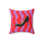 Pop-inspired throw pillow featuring a stylish black high heel on a vibrant red and purple wavy background.