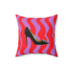 Colorful throw pillow featuring a pop art design with a black high heel shoe on a vibrant red and purple wavy background.