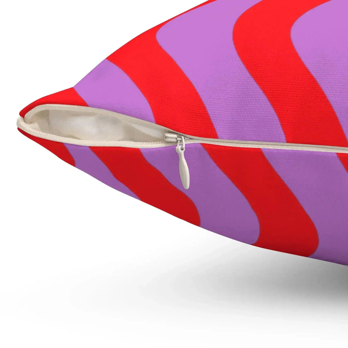 Colorful pop-inspired accent throw pillow featuring vibrant red and purple waves, perfect for adding a playful touch to any living space.