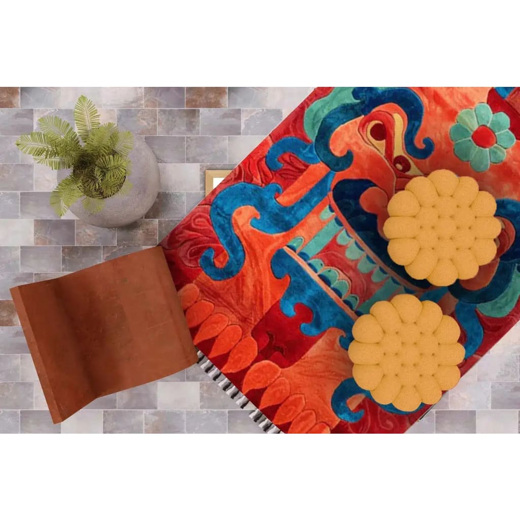 Top view of the Monarch of the Mountains Hand Tufted Area Rug, showcasing vibrant abstract designs with bold blues, reds, and oranges, perfect for adding a pop of color to a living room or bedroom. This 8x10 wool rug is an ideal choice for those seeking unique area rugs for their living room.