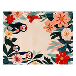 A beautifully hand-tufted wool area rug featuring a whimsical design with playful monkeys and vibrant floral patterns. This rug is perfect for adding a touch of fun and color to any living room.