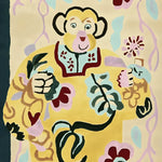 Vibrant hand tufted wool area rug featuring a whimsical monkey design in bold yellow and multicolored abstract patterns, perfect for adding a touch of contemporary flair to living room area rugs.