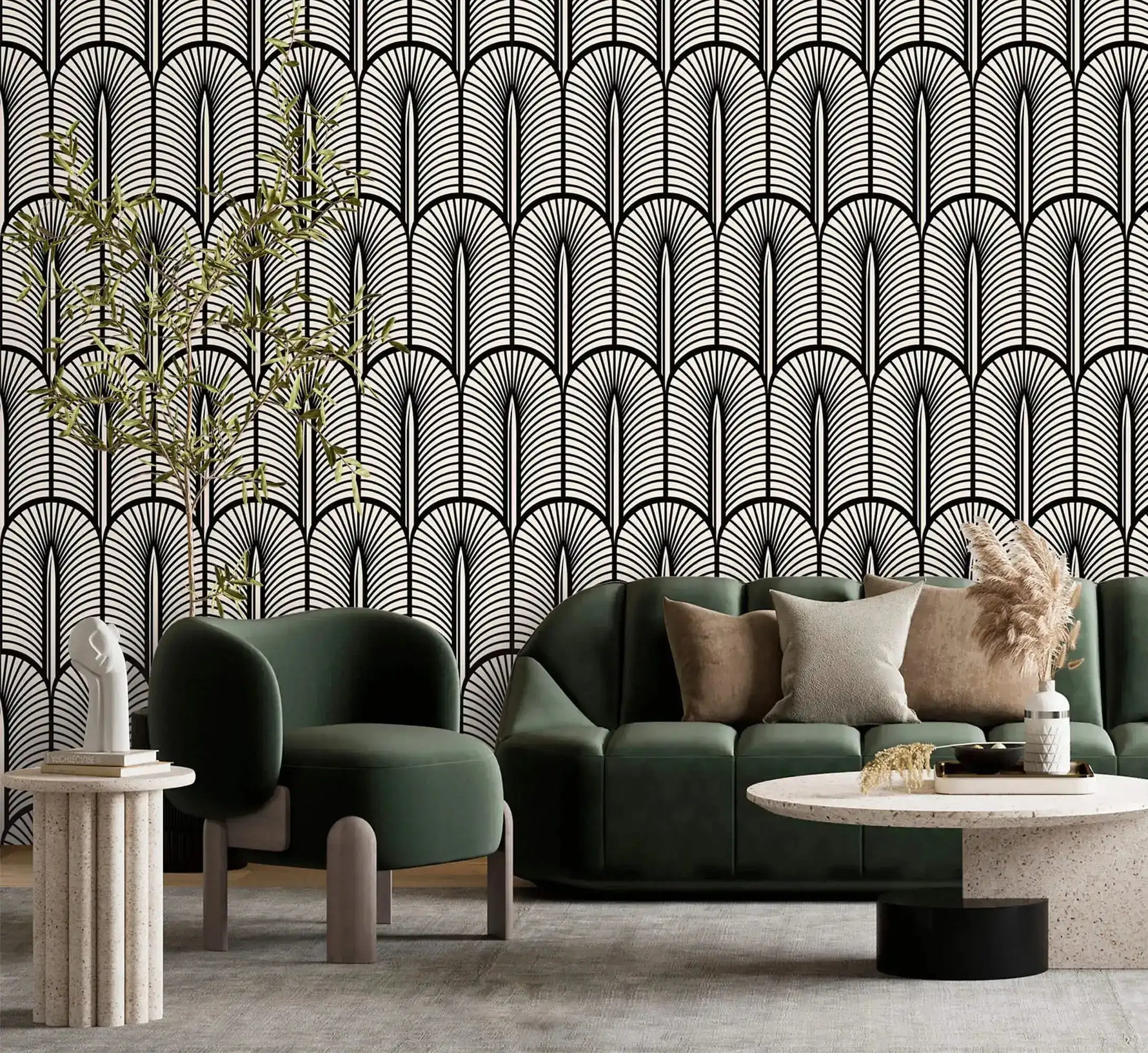 Monochrome Deco Elegance wallpaper of arched fan motifs in black and cream behind a green sofa