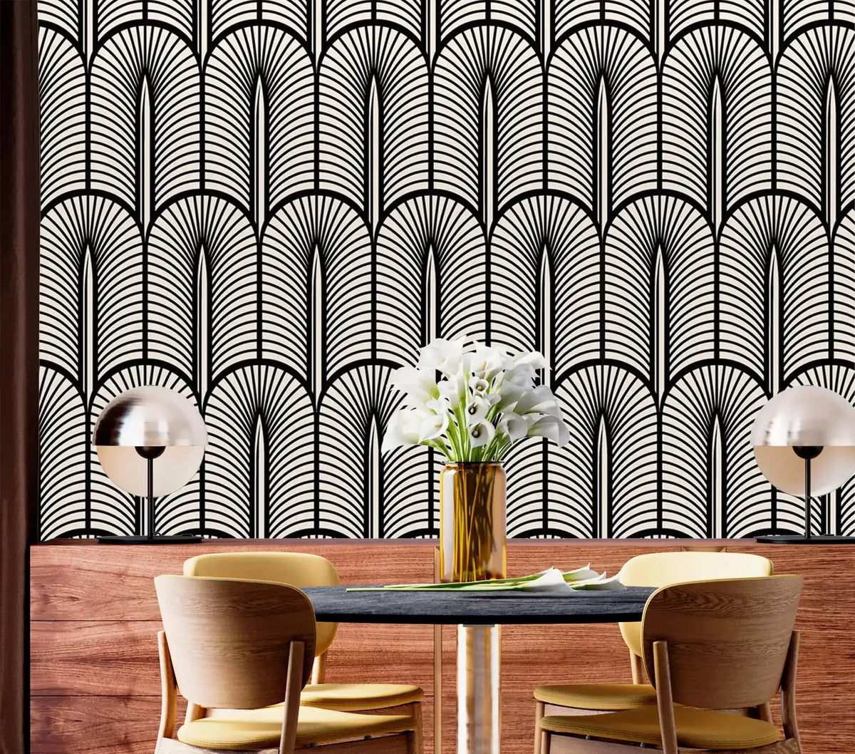 Monochrome Deco fan wallpaper over wood panelling in a dining nook with round table