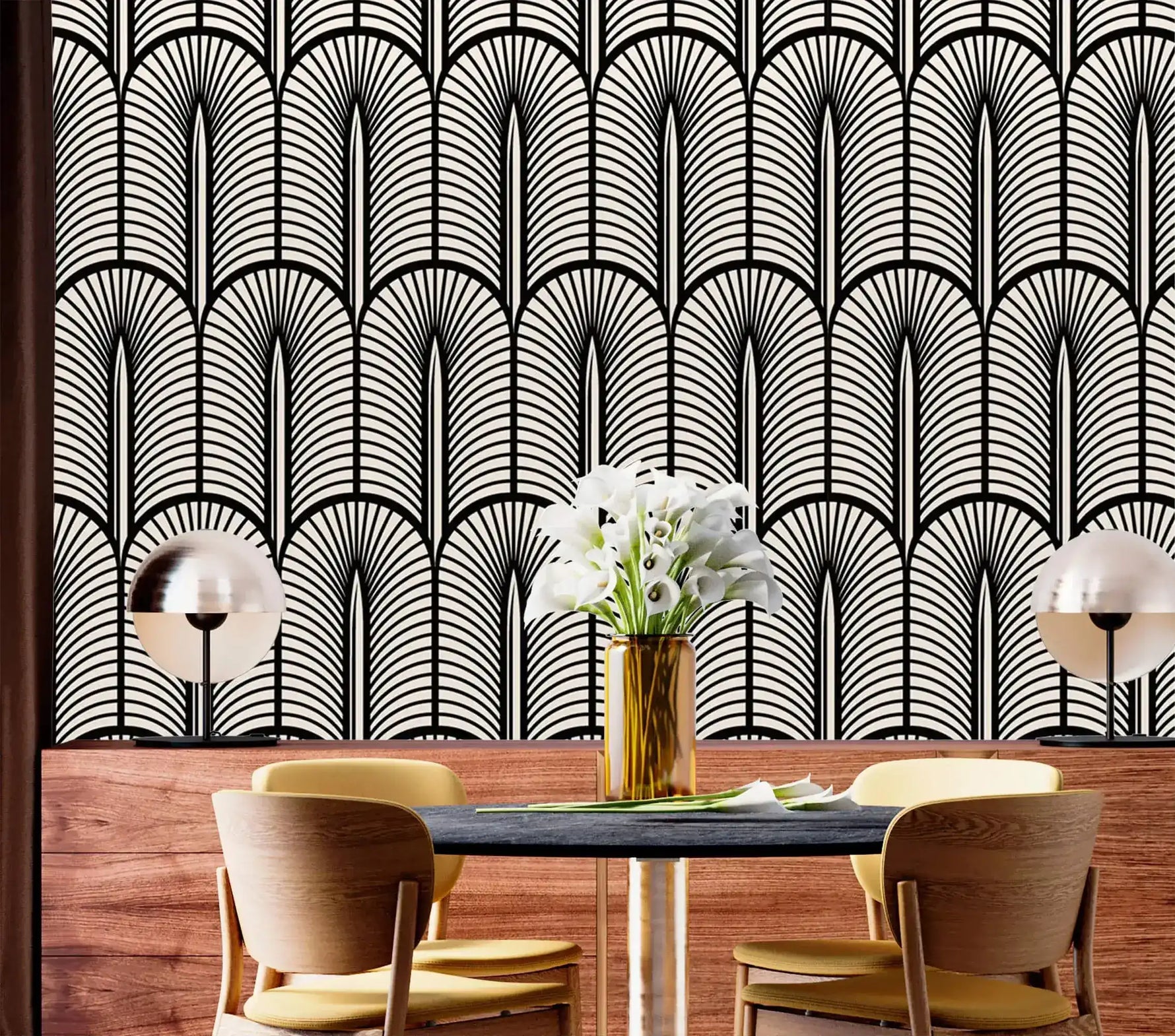 Monochrome Deco fan wallpaper over wood panelling in a dining nook with round table