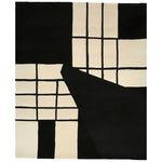 A contemporary area rug featuring a monochrome grid pattern in black and white. This wool rug is perfect for modern living room decor, sized 8x10, offering a stylish and artistic touch to area rugs for living rooms.
