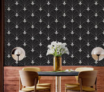 Monochrome Majesty black Art Deco arch wallpaper as feature wall in dining room with wood wainscoting and globe pendant lamps