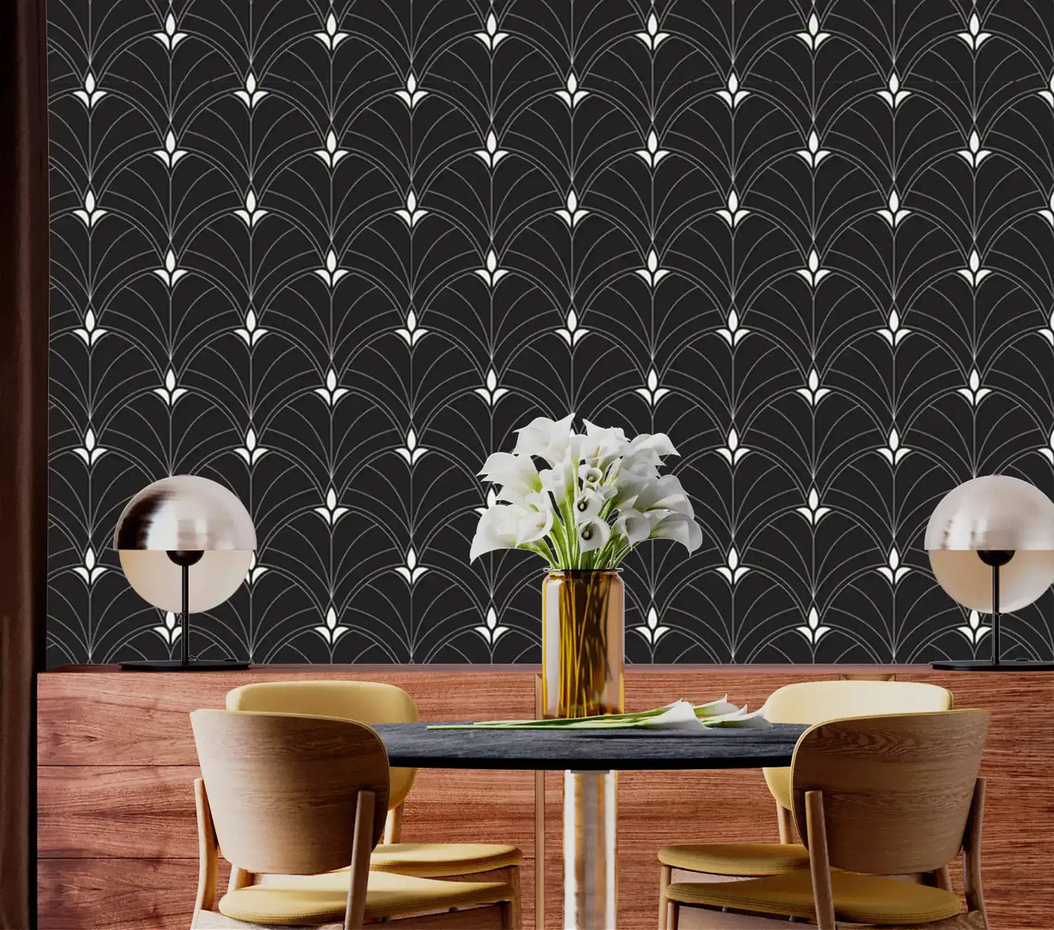 Monochrome Majesty black Art Deco arch wallpaper as feature wall in dining room with wood wainscoting and globe pendant lamps