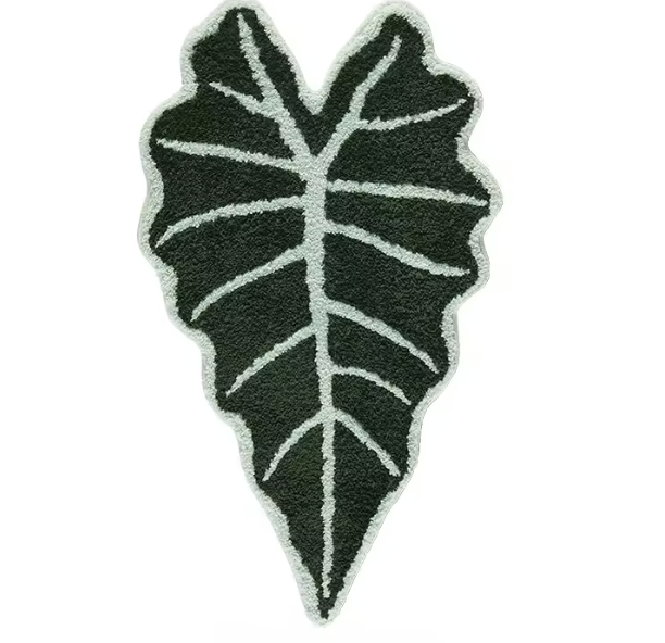 Black and white leaf-shaped rug on a white background