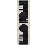The Moon Edge Hand Tufted Wool Rug features a striking contemporary design with bold black circles and stripes on a cream background. Perfect as a runner rug, this versatile piece complements kitchen, hallway, or bathroom spaces, adding a touch of modern elegance.