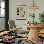A stylish, large area rug featuring an abstract dragon design adding a striking touch to a modern bedroom. This wool rug enhances the room's decor with its vibrant colors and intricate patterns, making it a perfect choice for bedroom rugs.