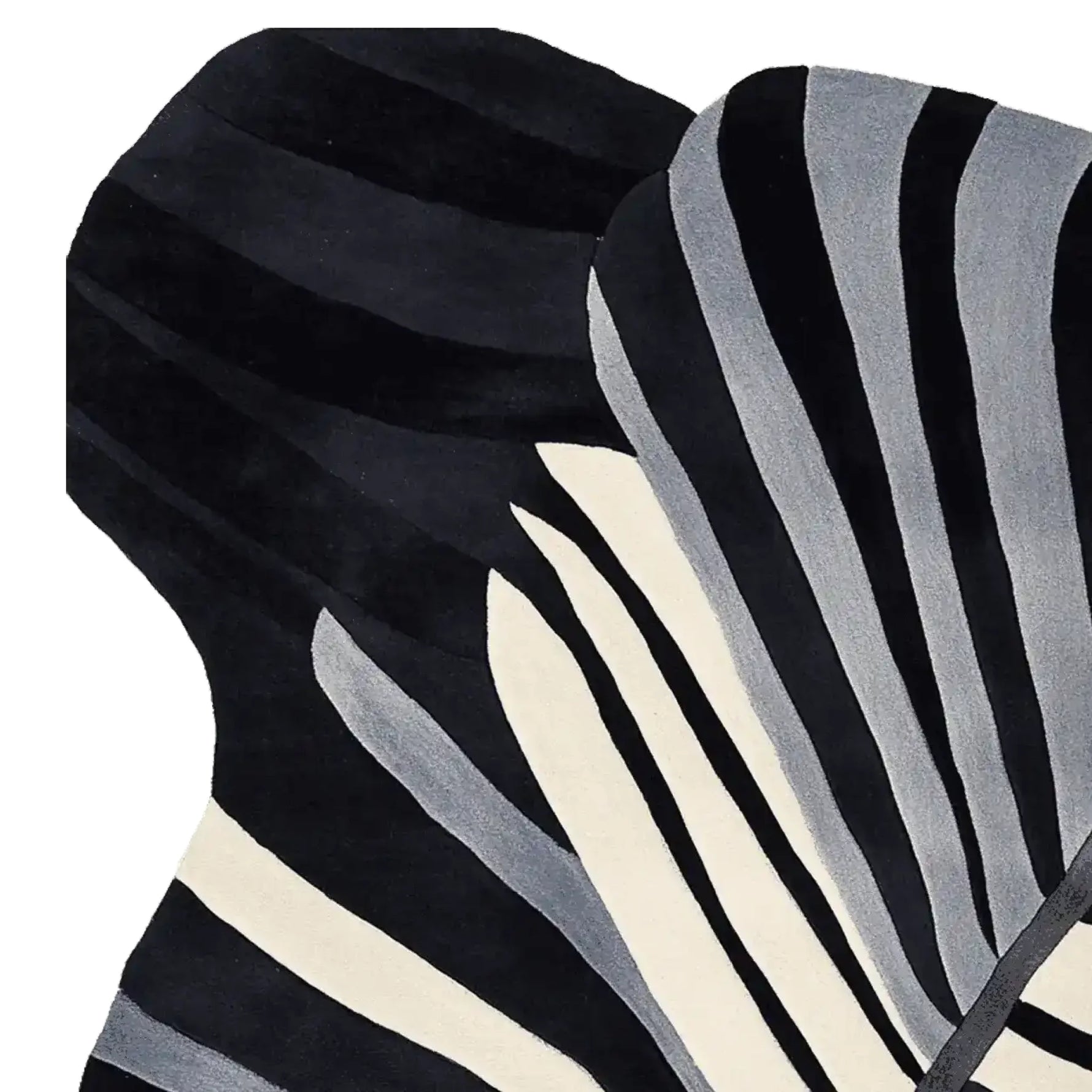 Close-up view of the Morph Flow Hand Tufted Area Rug, showcasing its striking black and white abstract design. This contemporary wool rug is ideal for adding a stylish touch to your living room decor. Perfect as a large living room rug, its unique pattern provides a modern aesthetic.