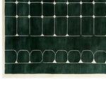 Top view of the Mosiac Haven Hand Tufted Wool Rug, featuring a contemporary geometric design with deep green and white colors, perfect for enhancing living room decor. This 8x10 area rug adds a stylish touch to any modern space, making it an ideal choice for those seeking high-quality wool rugs.