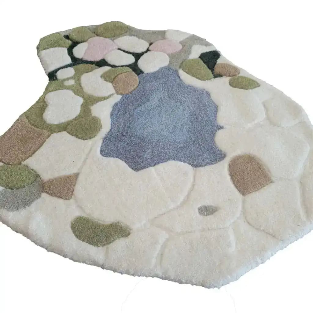 Explore the Moss and Meadow Hand Tufted Rug, a stunning area rug featuring an abstract design with earthy tones of green, blue, and beige. Perfect for adding a touch of nature to your office space, this wool rug serves as a large area rug ideal for creating a cozy and inviting atmosphere.