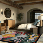 The Mountain Majesty Hand Tufted Rug adds a touch of elegance to a formal dining room setting. This square area rug features a vibrant floral design in rich colors, perfect for enhancing dining room decor. Crafted from luxurious wool, this rug blends beautifully with the surrounding furniture and decor, making it an ideal choice for a cozy and stylish atmosphere.