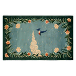 A beautifully designed Mountain Melody Hand Tufted Wool Rug featuring a vibrant floral pattern with lush green leaves and delicate flowers surrounding a whimsical bird motif. This large area rug is perfect for adding a touch of nature to your living room, crafted from high-quality wool for durability and comfort.
