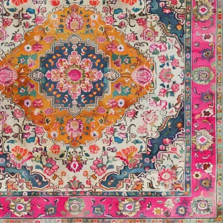 Vibrant multicolored floral wool area rug showcasing an intricate design with a central medallion, perfect for a dining room or living room. This square rug combines rich pink, orange, and blue hues, making it an eye-catching Persian-style carpet, ideal under a dining table or as a focal point in any room.