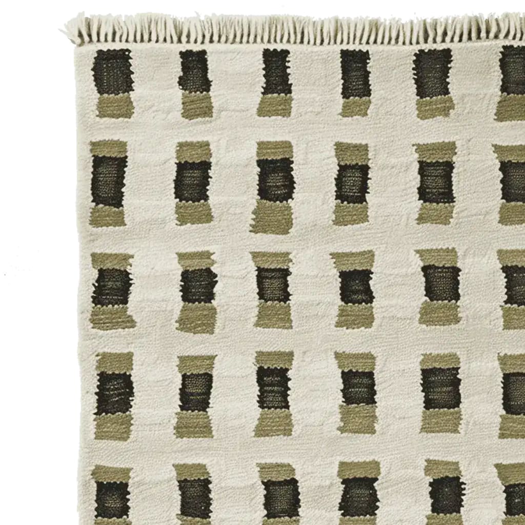 Close-up view of a contemporary hand-knotted wool rug with a geometric pattern, perfect for enhancing living room area rugs. The design features a grid of black and olive rectangles on a neutral background, showcasing modern elegance in area rugs.