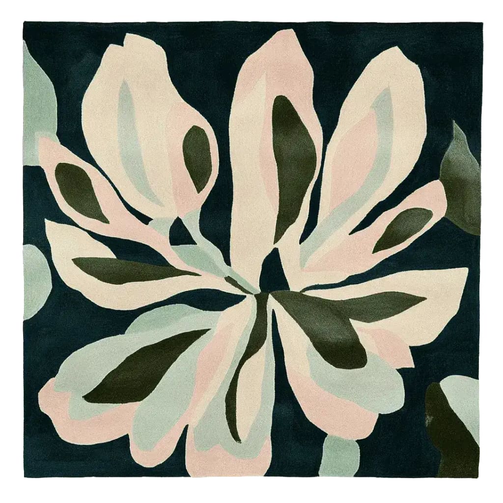Top view of the Muted Petal Dance Hand Tufted Area Rug, featuring a contemporary floral design in soft pink and green hues on a dark background. This square wool rug is perfect for adding a stylish touch to any living room.