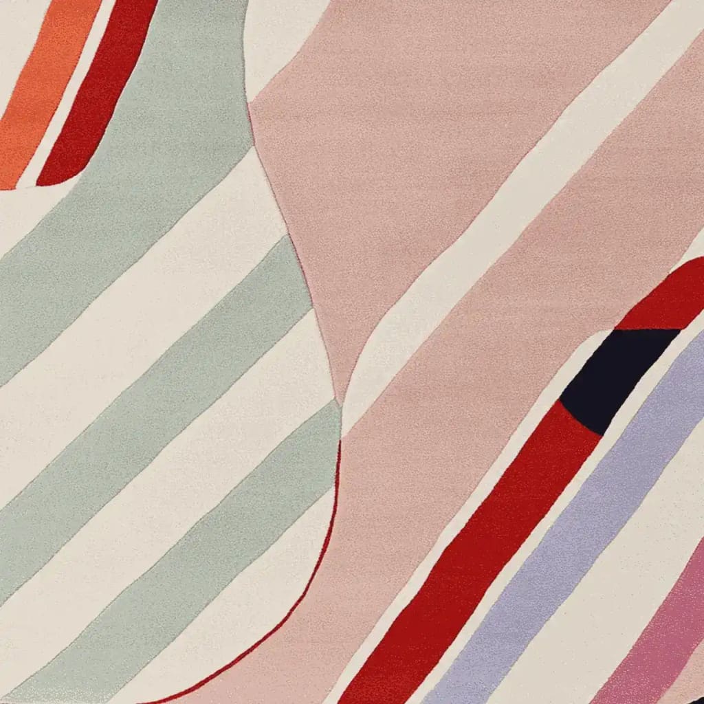 Close-up view of a contemporary hand-tufted wool area rug featuring muted shapes and dynamic stripes in pastel and bold colors. Ideal for enhancing large living room spaces, this rug blends modern design with comfort.