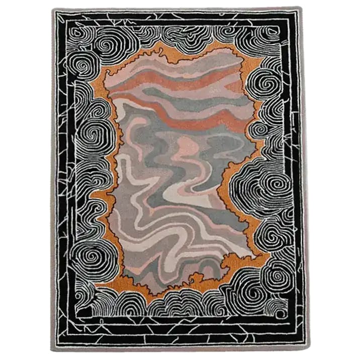 The "Mystic Drift Hand Tufted Wool Rug" features an intricate, flowing design that adds a sense of elegance and tranquility to any space. Made from high-quality wool, this rug provides softness, durability, and a timeless aesthetic for your home.