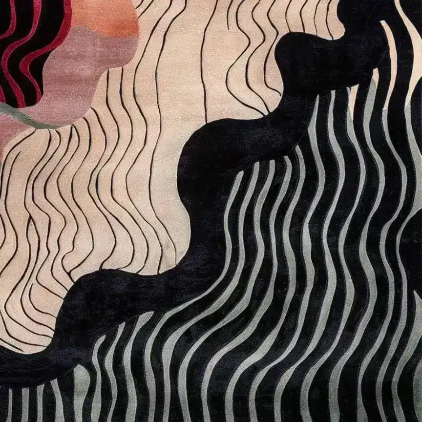 A stunning area rug featuring a contemporary design with flowing lines and abstract patterns in black, beige, and pink hues. This wool rug is perfect for adding a modern touch to living rooms, especially in an 8x10 size.