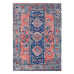 A beautifully crafted Mystic Heritage Hand Tufted Area Rug featuring an intricate vintage design. This wool rug is perfect for adding a touch of elegance to your living room, with a rich combination of blue and coral hues and detailed floral patterns.