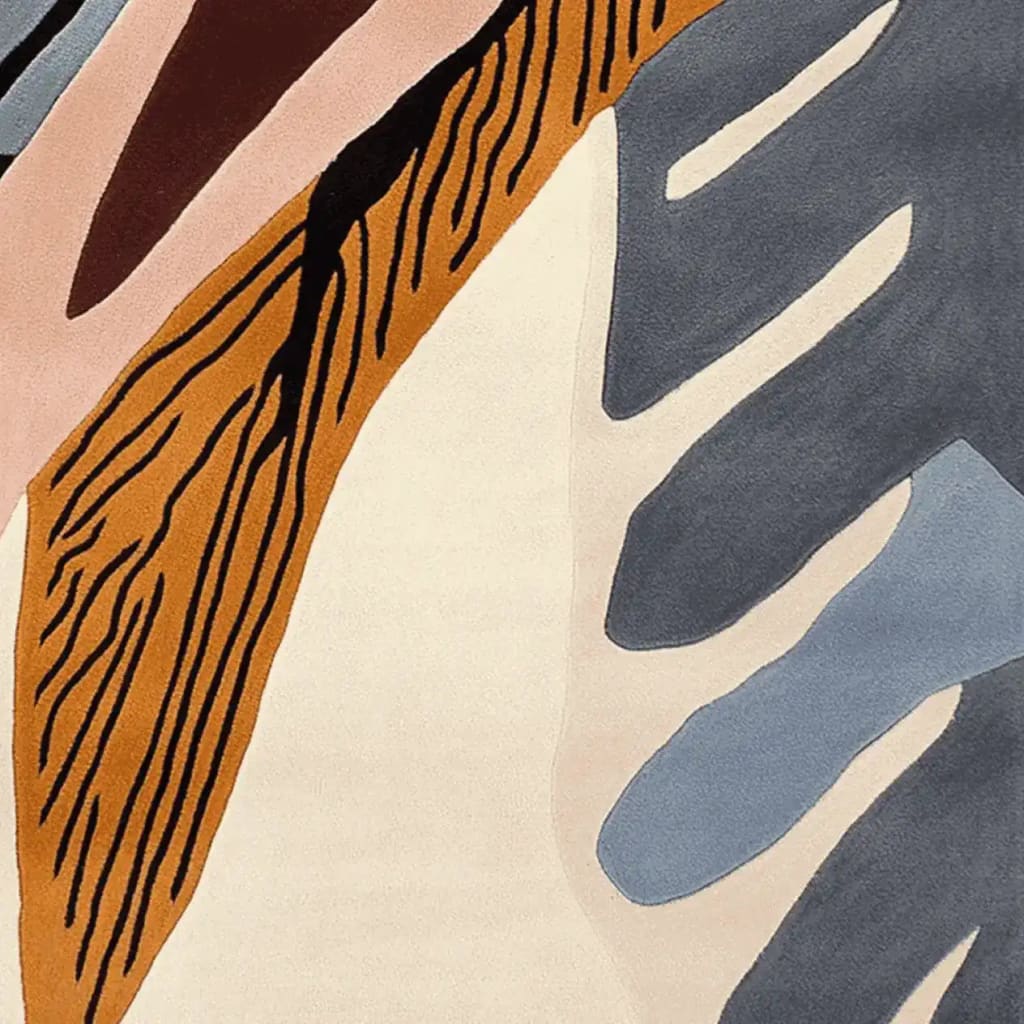 Close-up view of the Mystic Maze Hand Tufted Rug showcasing its abstract design with bold, swirling patterns in shades of blue, brown, and cream. This contemporary wool area rug is perfect for large living rooms, especially in an 8x10 layout.