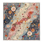 Mystic Meadow Hand Knotted Area Rug featuring a vibrant abstract floral design in shades of blue, pink, and red. This square area rug is perfect for contemporary living rooms or offices, adding a touch of elegance with its intricate wool texture. Ideal for those looking for unique living room area rugs or office rugs.