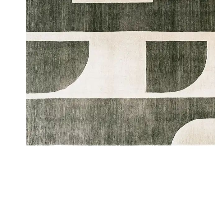Top view of the Mystic Realm Fusion Knotted Wool Rug, showcasing its contemporary design with geometric patterns in shades of gray and ivory. This area rug is perfect for living room spaces, adding a touch of modern elegance with its high-quality wool material.
