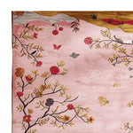 A beautiful Mystic Valley Bloom hand-tufted area rug featuring a vibrant floral design. The rug's intricate patterns and rich colors make it a perfect choice for enhancing living room decor. Made from high-quality wool, this large living room rug adds a touch of elegance and warmth to any space.