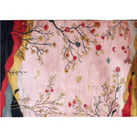 A stunning area rug featuring a hand-tufted floral design, perfect for adding a touch of elegance to any living room. The Mystic Valley Bloom rug showcases intricate branches and colorful flowers on a soft pink background, ideal for those seeking a wool rug with artistic flair. This large living room rug blends seamlessly with a variety of interior styles, making it a versatile choice for enhancing your home decor.