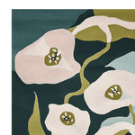 Close-up view of the Mythic Bloomfield Hand Tufted Area Rug, showcasing its contemporary design with abstract floral patterns. This wool rug is perfect for a modern living room, available in an 8x10 size for those seeking large living room rugs.