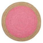 A vibrant, bright pink round jute area rug with a natural border, perfect for adding a pop of color to your living room. This boho rug combines style and functionality, making it an ideal choice for rugs for living room spaces.