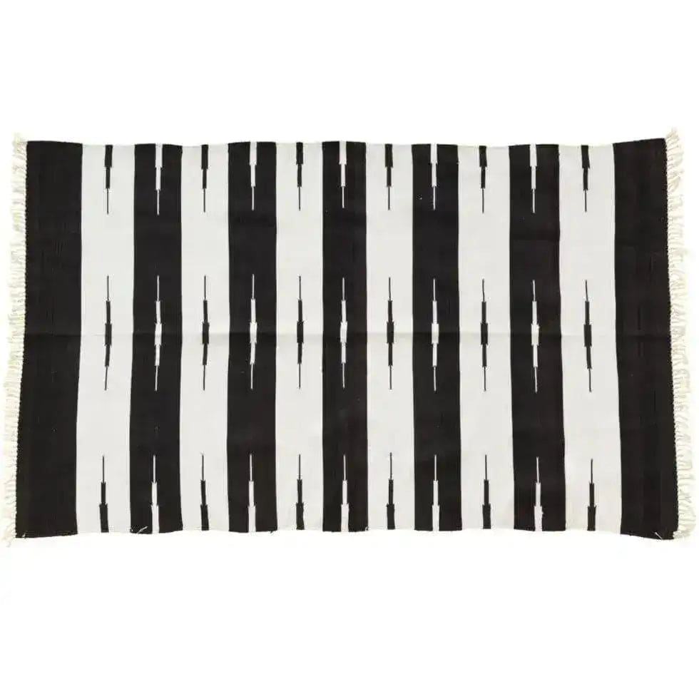 Stylish black and white striped area rug, perfect for adding a touch of elegance to your living room. This reversible cotton dhurrie is ideal for those seeking boho rugs or cotton rugs in an 8x10 size, making it a versatile choice for living room decor.